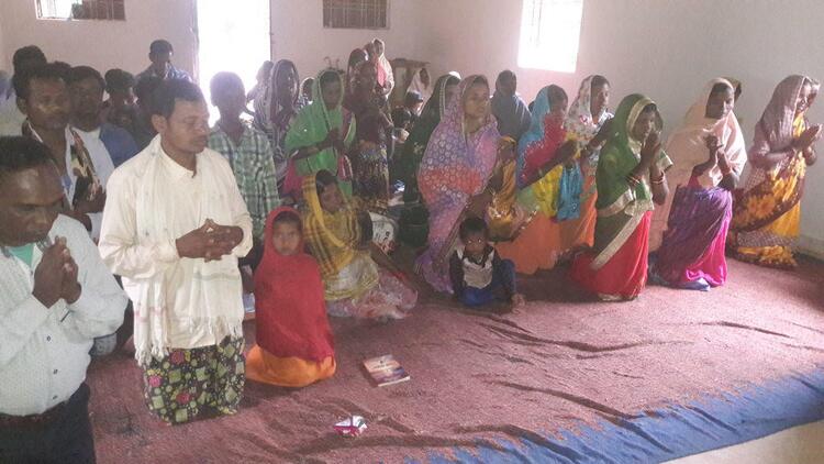Group prayer for their spiritual growth