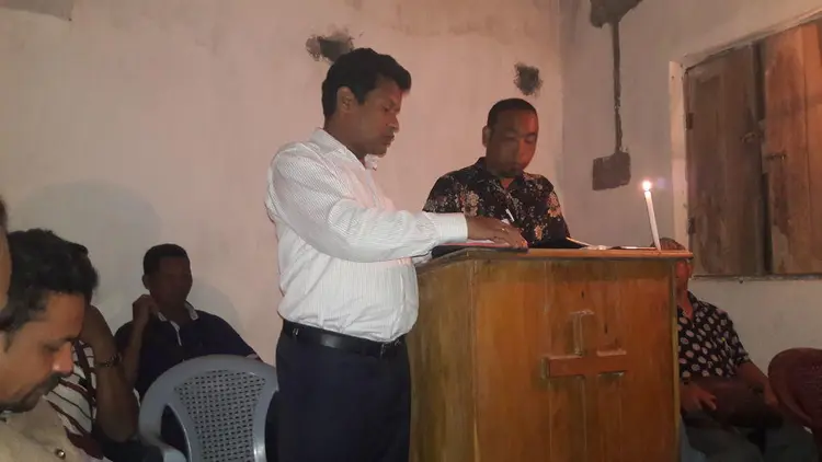 Rev Pangkaj and Executive Secretary sharing God's word in Orrisa