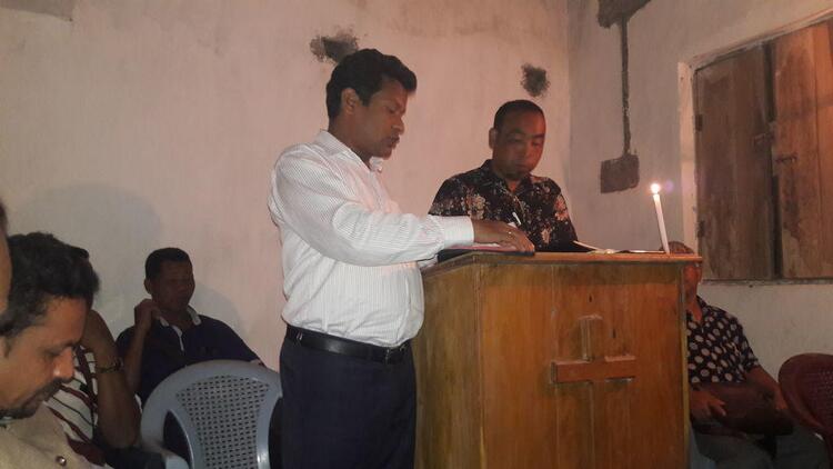 Rev Pangkaj and Executive Secretary sharing God's word in Orrisa